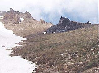 Dark rock in upper right extends about 400 feet through to the other side of the Soleiman peak. Image © 2006 by B.A.S.E.
