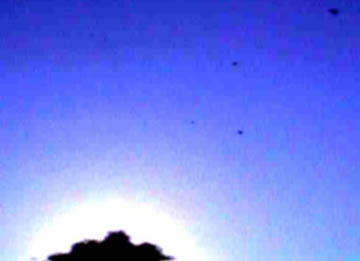 On September 24, 2003, six eyewitnesses in Oakvale, West Virginia, reported to UFOs Northwest several unidentified flying objects and one took the above photo on his digital camera.