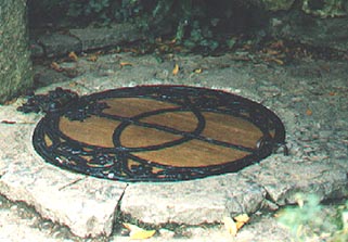 Chalice Well and its Vesica Piscis covering in Glastonbury, Somerset, England from Mysterious Lights and Crop Circles.