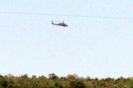 September 11, 2003, military helicopter that flew over the ridge near the Seip Mound in Bainbridge, Ohio, when Jeffrey Wilson and his colleagues investigated the "Mercedes-Benz" pattern that was determined to be manmade. Photograph © 2003 by Jeffrey Wilson.