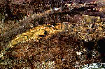 Photograph of ancient Serpent Mound near Locust Grove and Peebles, Ohio. Mound is 800 meters long (.5 miles) and its construction is placed around 800 A.D. Soybean formation was 3,000 feet ( a little more than a half mile) to the east of the serpent's tail shown at left of photo. Image courtesy Planetary and Space Science Centre, University of New Brunswick.