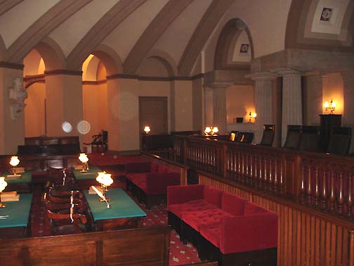 Above: Old Supreme Court Room photographed during tour of the Nation's Capitol, Summer 2005, Washington, D. C. Three unusual orbs are in the photograph, the largest being faint against the back column. Below: Close-up of the two brighter orbs to show what seems like motion in the one on the left and odd structure in the one on the right. Photograph © 2005 by Susan Saffa. 