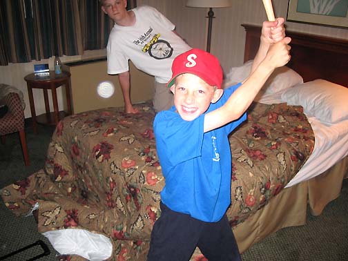 Above: June 2003, Holiday Inn in Brookline, Massachusetts. Camera was Canon Powershot A60 operated by boy's father, Peter Vachon. Below: Enlargement of the orb "engraved" with concentric circles.