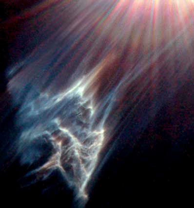 An black interstellar cloud is being destroyed by strong radiation from a nearby hot star named Merope in the Pleiades. Hubble telescope photograph courtesy NASA, The Hubble Heritage Team, George Herbig and Theodore Simon, Institute for Astronomy, University of Hawaii.