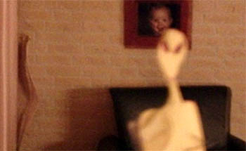 The fifth in a series of photographs taken by 24-year-old Robbert van den Broeke on May 6, 2004, between 3:32 a.m. and 4:14 a.m. (42 minutes) in the living room of his Hoeven, Holland home. Photograph © 2004 by Robbert van den Broeke.