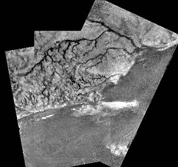 Earth-looking "river" system that is now assumed to drain methane from methane rains into methane seas on Saturn's huge, mysterious moon, Titan. Photograph courtesy European Space Agency (ESA).