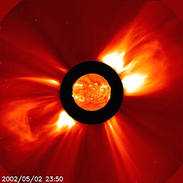 On May 2, 2002, solar coronal mass ejections (CMEs) blast plasma throughout the Solar System. The highest concentration of plasma in our Solar System is at the Sun. Over 99.999% of the Solar System by volume is plasma. Credit: SOHO Consortium, LASCO, EIT ESA, NASA.