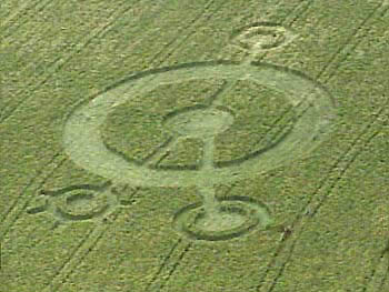 Spanish Fork, Utah, formation in barley first noticed by farm owners on Saturday night, June 26, 2004. Large right measured 25 feet east to west and 24.5 feet north to south, almost a perfect circle. Whole formation, including later added fourth "eyeball" measured 207 feet by 118 feet. Aerial photograph prior to July 1, 2004, © 2004 by KSL-TV, Channel 5, Salt Lake City, Utah.