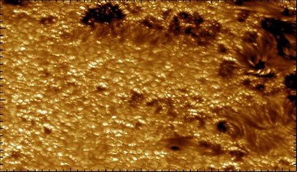 Black tick marks at the perimeter of this solar image are 1000 kilometers (622 miles) apart. Each granule, or cell, on the sun's surface is about the size of Texas. This image near the eastern limb of the sun was first taken on July 24, 2002, by Prof. Goran Scharmer and processed by Dr. Mats G. Lofdahl, Institute for Solar Physics, Royal Swedish Academy of Sciences. 