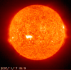 The large white spot on the face of the sun is called "Sunspot 822." Its current length on November 17, 2005, is 87,000 miles (140,000 km), about the size of Jupiter. According to SpaceWeather.com, "This sunspot poses a threat for M-class solar flares. NOAA forecasters estimate a 50% chance of one during the next 24 hours. Eruptions in the days ahead could cause magnetic storms on Earth." November 17, 2005, solar image by Solar and Heliospheric Observatory (SOHO).