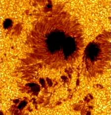 July 15, 2002, "most detailed images ever of sunspots" (Region 10030) on sun's granular surface by solar telescope in La Palma, Canary Islands, off African coast. Resolution is 62 miles (100 km). Colorized image by Royal Swedish Academy of Sciences Institute for Solar Physics.
