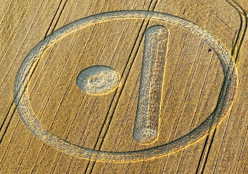 Stanton St. Bernard, near Alton Barnes, Wiltshire, England, reported August 12, 2007. Pattern is equivalent to the Mayan number "6." Reported six days before August 18, 2007. Aerial image © 2007 by Philippe Ullens. Also see:  Cropcircleconnector.com.
