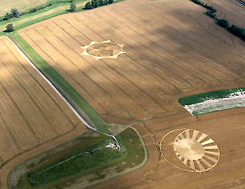  West Kennett 8-pointed star reported July 29, 2004, and "moon and sun" reported two weeks earlier on July 13, 2004, in wheat field near Silbury Hill. Photograph © 2004 by Cropcircleconnector.com.
