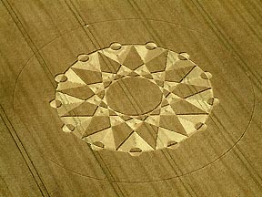  Thirteen perimeter circles and thirteen pointers at West Stowell, near Huish, Wiltshire, England, reported July 20, 2003. Aerial photograph © 2003 by Nick Nicholson and the Crop Circle Connector.