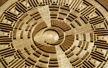 Above and below: Close-up aerial photographs of the Wayland's Smithy, Wiltshire, "Mayan" glyph © 2005 by Lucy Pringle.