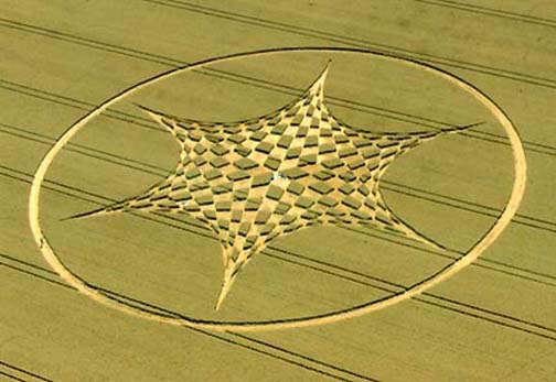6-pointed wheat pattern filled with nearly a hundred diamond, or lozenge, shapes of standing crop was reported on Sunday morning, August 6, 2006; 330 feet in diameter. Aerial image © 2006 by Cropcircleconnector.com.