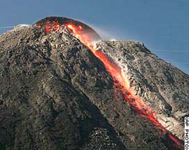 Mt. Merapi volcano near heavily populated Yogyakarta, Indonesia, on May 13, 2006. Rising 9,700 feet (2,900 meters), Merapi has been steadily active for more than a decade. Image © 2006 by AP.