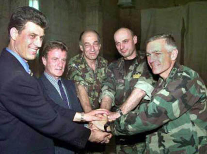 Left to Right: Hashim Thaci, UCK (KLA) leader; Bernard Kouchner, UN Administrator of Kosovo; Gen. Sir Michael Jackson, KFOR Commander; Agim Ceku, Commander of KPC; Gen. Wesley Clark, NATO Commander. 1999 photo from Kosovo Crisis: a Study in Foreign Policy Mismanagement by Dr. Vojin Joksimovich.