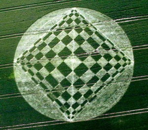 June 18, 2000, this extraordinary 270 foot diameter formation in wheat was discovered at ancient Windmill Hill (3700 B. C.) not far from the sacred Avebury stone circle and avenues. Aerial photograph © 2000 by Francine Blake with her permission.