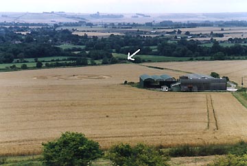 White arrow points to the Woodborough bridge between the Woodborough church and the Carson barns. "Bear claw" formation is on the left of the barns, reported on July 14, 2003, by Andy Buckley. Photograph © 2003 by Linda Moulton Howe.