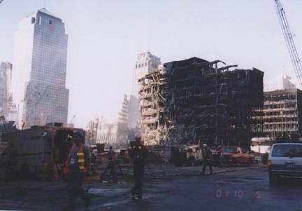 Ground Zero, New York City, on October 4, 2001 where the two 110-story World Trade Towers used to stand. Their steel tubing melted in the 1000 degrees Fahrenheit-plus temperatures of burning jet fuel after terrorists linked to Osama bin Laden flew American jet liners into each building on September 11, 2001. Photograph © 2001 by Linda Moulton Howe.