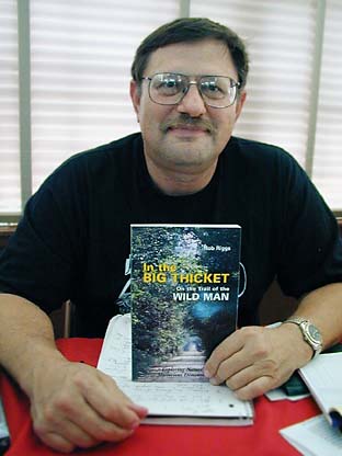 Rob Riggs holding his book at 2001 Texas Bigfoot Conference in Jefferson, Texas north of the Big Thicket National Preserve. Photograph © 2001 by Andy Abercrombie.