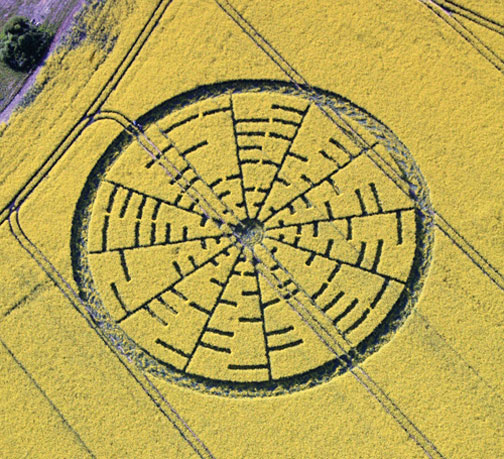  300-foot-diameter formation in 5-foot-tall oilseed rape near the Wilton Windmill in Wiltshire, England, first reported around noon on Saturday, May 22, 2010. Aerial photograph © 2010 by Lucy Pringle. Images and information by:  Cropcircleconnector.com