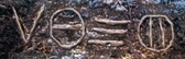 Top: Frame from 16mm B&W film of I-beam imprinted with early to classic Greek letters allegedly found in crash debris retrieved near Socorro, New Mexico, between May 31 to June 2, 1947, a month before the famous July 4 - 6, 1947, crashes around Roswell, New Mexico. Bottom: Boston University Geologist Robert M. Schoch, Ph.D., photographed these four similar ancient Greek letters over an entrance at the Cheops great pyramid near Cairo in the 1990s. Image © by Robert M. Schoch, with permission.