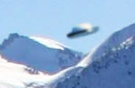 Unidentified aerial disc above Mammoth Mountain Ski Area, California, on February 19, 2004, at 9:35:43 AM (camera time stamp).