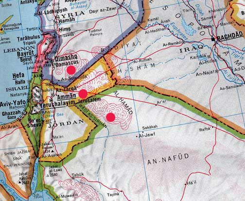 The Harrat Ash Shaam (also known variously as the Harrat Ash Shamah and the Harrat e-Shamah) is a volcanic field covering a total area of some 40,000 square kilometers (15,000 square miles). This massive alkaline volcanic field extends from southern Syria, across Jordan east of Amman near Azraq ed Duraz, and into northwestern Saudi Arabia. Thousands of circular patterns in the black lava rocks date back between 2,000 and 9,000 years ago, but functions are unknown.