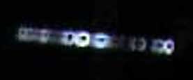 November 5, 2007, beginning at 9:34 PM Central, Sarcoxie, Missouri. One of twelve images shown in this Earthfiles report of unknown, small, aerial object close to ground photographed over four hour period on Missouri hunter's Cuddeback Digital Camera.