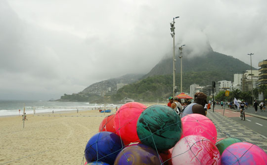 Our hotel was across the street from the beach that ended at a rain forest mountain rising into the misty clouds.  September 26, 2010 image © by Linda Moulton Howe.