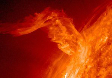 Huge, twisting coronal mass ejection (CME) erupting thousands of miles into space. If powerful CME's unleash a path of solar particles headed straight for Earth, then satellites, communications, air traffic and power grids can be affected - even brought down. How big will Solar Cycle 24's Maximum be in 2013? Image by SOHO.