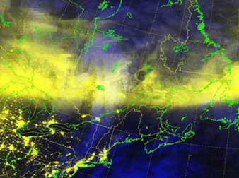 Earth's intense October 25, 2011, geomagnetic storm provoked by the sun's strong coronal mass ejection (CME) the day before created bright auroras in a band (yellow) that dropped down from Canada over the United States as far south as Louisiana. This image created by Paul McCrone at the Fleet Numerical Meteorology and Oceanography Center used October 25, 2011, 0140 GMT, visual and infrared data from the Defense Meteorological Satellite Program's F18 polar orbiter.