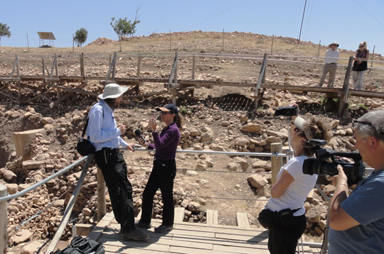 Earthfiles Reporter and Editor Linda Moulton Howe interviewed Robert M. Schoch, Ph.D., Geologist, Boston University, inside the Gobekli Tepe, Turkey, excavation site on June 13, 2012.  Right is Jennifer Stein running video camera for Linda and Leo Skorpion, videographer, Skorpion Film Production. Image by Gregory Poplawski for Earthfiles.com.