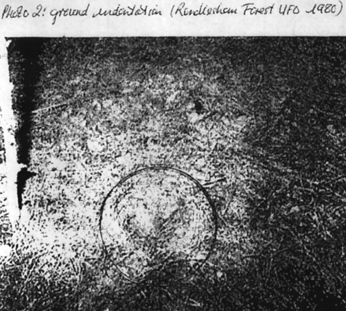 Photograph of triangle-shaped indention in the soil of Rendlesham Forest “landing site.”