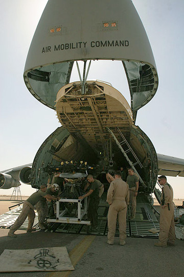 A C-5 Galaxy offloads its cargo. Image courtesy USAF.