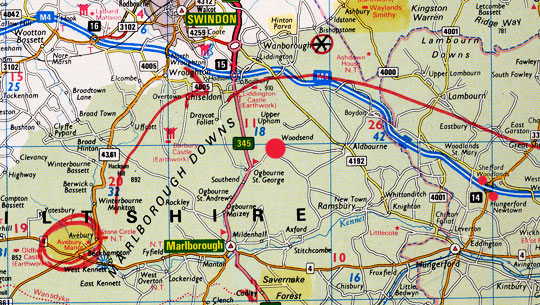 Whitefield Hill is near Woodsend, Wiltshire, (red circle map center) about six miles north of Marlborough. Southeast of Woodsend are the ancient stone circles of Avebury and Silbury Hill, the largest, artificially constructed hill in Europe (red circle in lower left). To the southeast of Woodsend is Hungerford and the nearby M4 motorway where the two “grid and dots” crop patterns were discovered north and south of the M4 on July 30, 2010. See: 080410 Earthfiles.