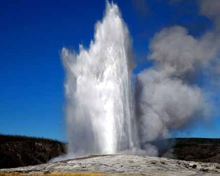 Old Faithful is a cone geyser located in Wyoming's Yellowstone National Park. The geyser erupts with a frequency that can range between 45 to 125 minutes, for 1.5 to 5 minutes and can erupt as high as 106 to 185 feet. Image by USGS.