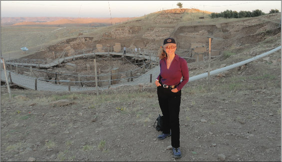 Investigative reporter Linda Moulton Howe at archaeological dig site of 12,000-year-0ld
Gobekli Tepe, Turkey, on June 13, 2012. Afterward, Linda produced 10,000 B. C. Gobekli Tepe and Ancient Stone Circles — E. T. Terraforming? Image by Jim Sorensen.