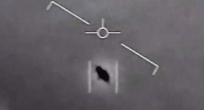 A 2004 infrared video frame shows an encounter near San Diego, California, between two Navy F/A-18F fighter jets and an unidentified aerial or flying object, UFO/UAP. It was released by the Defense Department's Advanced Aerospace Threat Identification Program (AATIP) on December 16, 2017, through The New York Times, The Washington Post and Politico. Source: U.S Department of Defense.