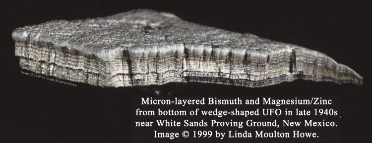 Alleged extraterrestrial metal from bottom of a “wedge-shaped craft” between Sierra Blanca and San Mateo Mountains west of Roswell, New Mexico, in late 1940s, made of 26+ alternating layers: 1 to 4 microns dark bismuth and 100 to 200 microns silver magnesium/zinc alloy. Each of six pieces received from U. S. Army source were “formed” with a curvature that tapered. Photograph © 1999 by Linda Moulton Howe with Tim Bauer.