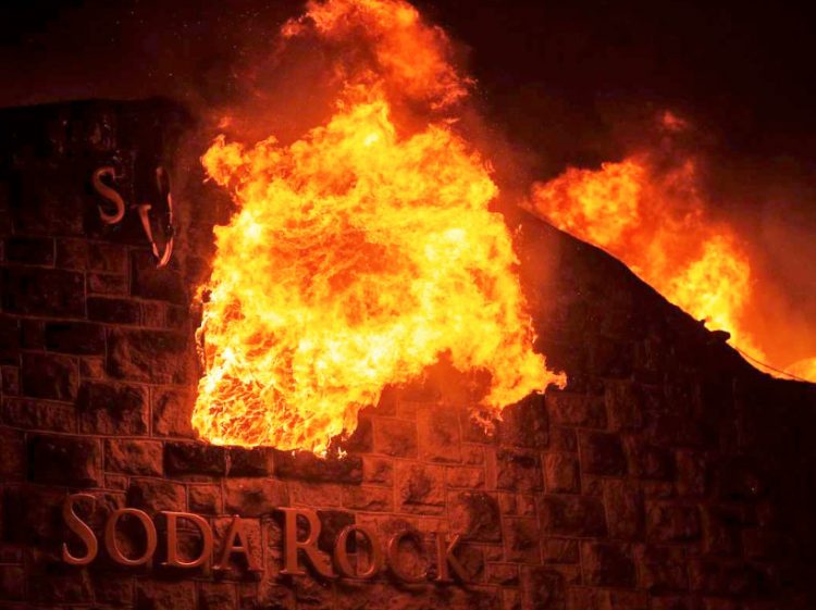 Soda Rock Winery in Sonoma County's Healdsburg, California, was destroyed on Sunday, October 27, 2019, by the fast-moving Kincade Fire that has been burning since October 23, 2019, fanned by intense winds up to 80 mph, causing widespread evacuations. 3,441 people are battling the blaze, but 94 structures have been destroyed and 17 damaged. At least 54,298 acres have burned up and only 5% of the fire raging around Santa Rosa, California, has been contained.