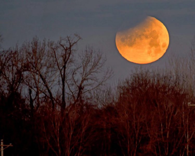 Above photo of partially eclipsed moon by Ken Christison On the night of July 16-17, 2019, much of the world can watch a partial eclipse of the full moon. This will be the last time that the moon sweeps through the Earth’s dark umbral shadow until the total lunar eclipse on May 26, 2021.