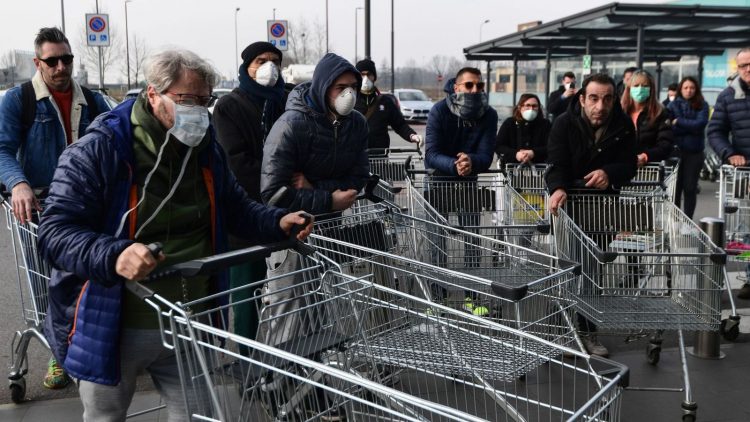 In the small Italian town of Casalpusterlengo on Sunday, February 23rd, 2020, residents wearing face masks were only allowed into supermarket in small groups of 40 people at a time, as the Italian authorities are desperately trying to reduce the number of confirmed COVID-19 coronavirus cases as Italy exploded with more than 200 in only the past few days. Image by Sky News.