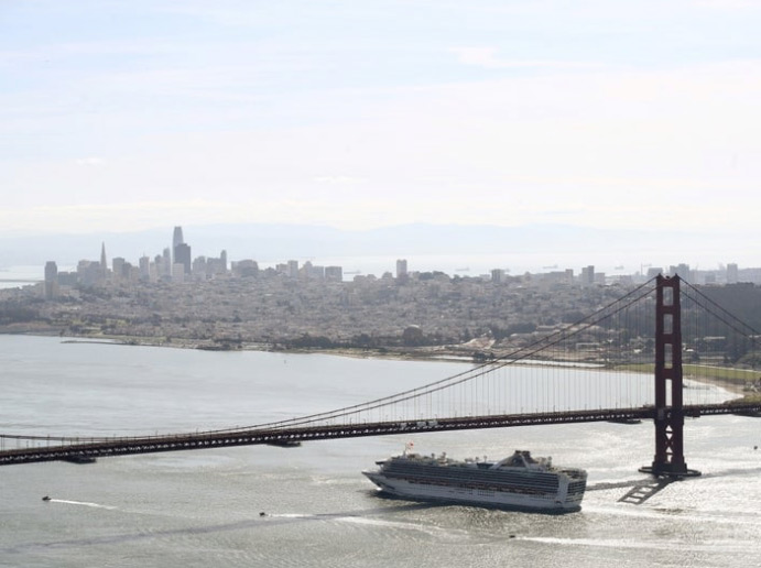 The cruise ship Grand Princess finally being allowed to dock in Oakland, California, on March 9, 2020, after 21 passengers tested positive for COVID-19, threatening the other 3,000 passengers with infection. That's why the ship ordered everyone to stay in their rooms in self-quarantine. Image by Getty.