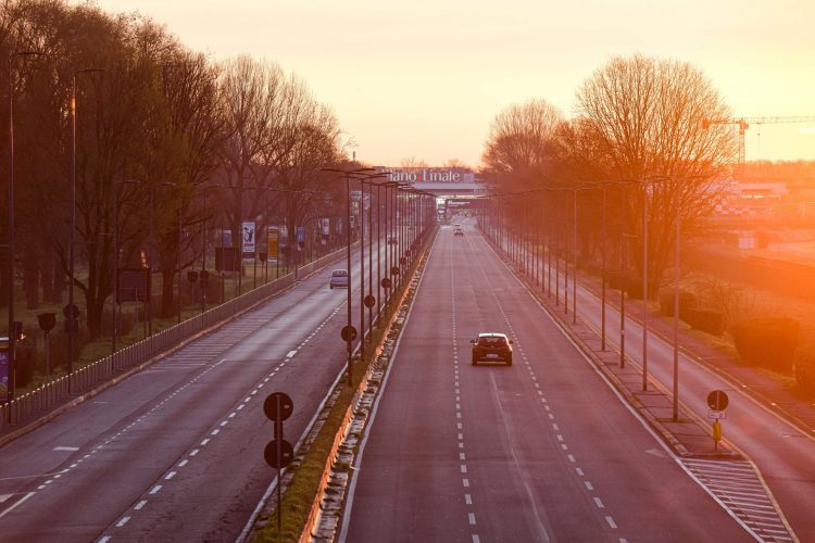 Early Sunday morning, March 8, 2020, the road to Milan, Italy's Linate Airport is almost empty after the 2 AM government order to lockdown some 16 million people in northern Italy in a desperate effort to try to contain the COVID-19 pandemic now infecting people in 104 nations, about half the world. Image by Piero Cruciatti/AFP/Getty.