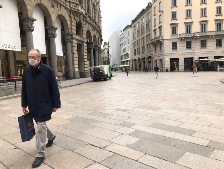 Nearly empty Corso Vittorio Emanuele, the busiest pedestrian street in downtown Milan, Italy, on March 9, 2020, after Prime Minister Conte orders ALL of Italy to be locked down in volunteer quarantines, while all schools and universities are also closed in an effort to slow down the dangerous COVID-19 has infected 9,172 and killed 463. Image by Getty.