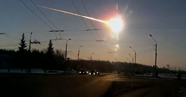 Meteor fireball seen from Kamensk-Uralsky, Russia, on February 15, 2013, at dawn when the space rock moving at 42,900 mph exploded in a fiery air burst that damaged 7,200 buildings, collapsed a factory roof and shattered many windows. Image by Aleksandr Ivanov.