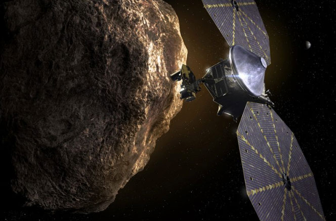 Artist's illustration of NASA's Lucy spacecraft exploring a Jovian Trojan asteroid. Image by NASA.